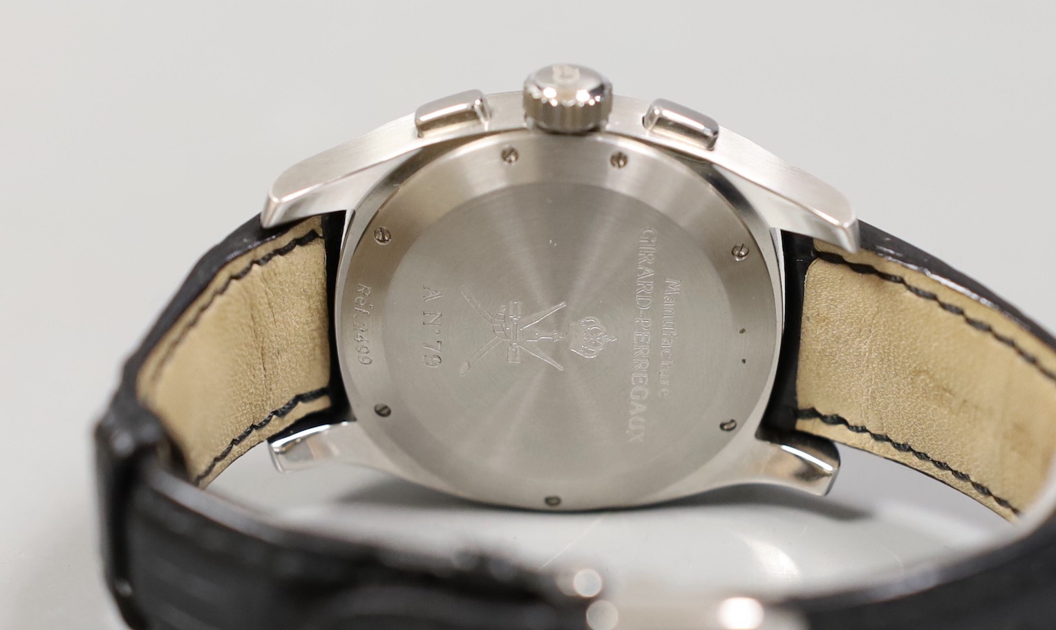 A gentleman's early 2000's stainless steel Girard Perregaux automatic chronograph wrist watch, model no. 2499, the case back engraved AN.79, with box and booklet, case diameter 39mm, on Girard Perregaux leather strap wit